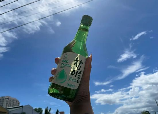 Soju bottles - green alcohol closely. Stock Photo by ©oilslo 37027533