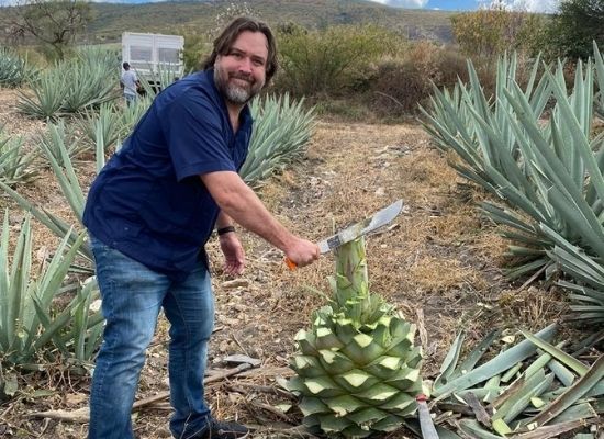 John Swartz in an agave field